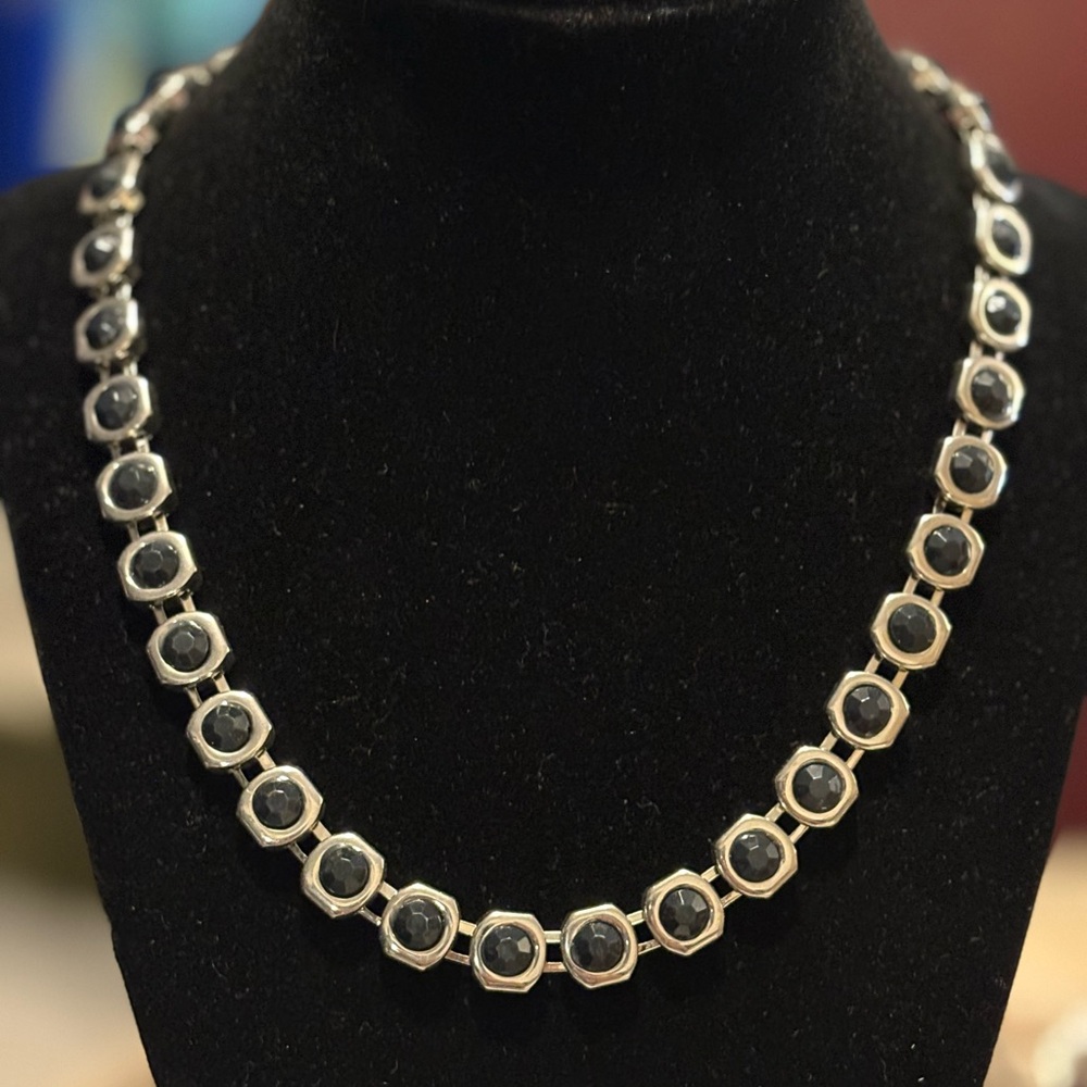 Silver tone and navy faux stone necklace 16” with an attached extension.